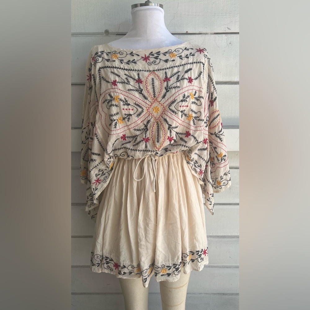 Free People cream embroidered mini dress.